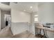 Upstairs loft with carpeted floors, neutral walls, a desk, and a nearby printer at 365 Andy Wheeler Dr, Henderson, NV 89011