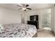 Spacious main bedroom features a ceiling fan and ensuite bathroom access at 365 Andy Wheeler Dr, Henderson, NV 89011