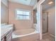 Bright bathroom features a tiled bathtub and a separate glass-enclosed shower at 412 Lost Trail Dr, Henderson, NV 89014
