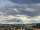 Expansive city view with a bird silhouetted against a dramatic sky at 412 Lost Trail Dr, Henderson, NV 89014