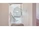 Open entryway featuring large windows, tile flooring, and carpeted stairs at 412 Lost Trail Dr, Henderson, NV 89014