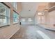 Bright living room featuring tall ceilings, tile foyer entry, and multiple windows at 412 Lost Trail Dr, Henderson, NV 89014