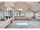 Bright open living space with high ceilings, neutral colors, and large windows at 412 Lost Trail Dr, Henderson, NV 89014