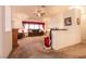 Spacious living room with two brown sofas and a ceiling fan at 448 Golden State St, Henderson, NV 89012