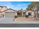 Charming single-story home featuring a two-car garage and low maintenance desert landscaping at 4546 Cliff Breeze Dr, North Las Vegas, NV 89081