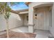 Front entrance with a security door and stone accents at 4546 Cliff Breeze Dr, North Las Vegas, NV 89081