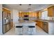 Kitchen boasts stainless steel appliances and an island with seating at 5859 Noble Stand St, Las Vegas, NV 89148