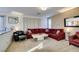 Living room featuring a large sectional sofa and coffee table at 5859 Noble Stand St, Las Vegas, NV 89148