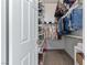 Walk-in closet with shelves, hanging rods, and drawers at 6168 Isthmus Cir, Las Vegas, NV 89110