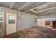 Covered back porch with unique stone flooring and natural lighting at 632 Avenue D, Boulder City, NV 89005