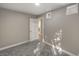 This bedroom features neutral walls, carpet flooring, and a standard door frame at 632 Avenue D, Boulder City, NV 89005