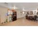 Bedroom with tiled floors and interesting decor including a motorcycle inside the house at 632 Avenue D, Boulder City, NV 89005
