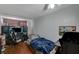Cozy bedroom with laminate flooring, providing a dedicated space for gaming at 632 Avenue D, Boulder City, NV 89005
