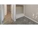 Open closet with view of carpet and wood-look tile and hallway at 632 Avenue D, Boulder City, NV 89005