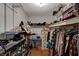 Walk-in closet featuring custom shelving, rods for hanging, and ample storage space for shoes and accessories at 632 Avenue D, Boulder City, NV 89005
