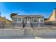 Charming single-story home with a landscaped front yard and inviting entryway at 632 Avenue D, Boulder City, NV 89005