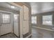 Kitchen with white cabinets, appliances, and door leading outside to provide convenience at 632 Avenue D, Boulder City, NV 89005