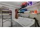Laundry room with washer, dryer, shelves and ample storage space at 632 Avenue D, Boulder City, NV 89005
