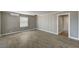 The living room offers wood-look tile flooring and light-colored walls at 632 Avenue D, Boulder City, NV 89005
