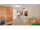 Living room with tiled floors connects to other rooms and features plenty of storage and exterior access at 632 Avenue D, Boulder City, NV 89005