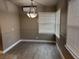 Bright dining area with tile floors and a modern light fixture at 632 D, Boulder City, NV 89005