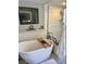 Elegant bathroom includes a freestanding tub, walk-in shower, and modern fixtures at 738 Tam O Shanter, Las Vegas, NV 89109