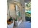 Spa-like bathroom with walk-in shower, soaking tub, and marble finishes at 738 Tam O Shanter, Las Vegas, NV 89109