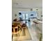 Open dining area with a modern table and chairs, adjacent to the kitchen at 738 Tam O Shanter, Las Vegas, NV 89109