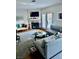 Comfortable living room with sectional sofa, fireplace, and large windows at 738 Tam O Shanter, Las Vegas, NV 89109