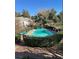 Community pool with surrounding landscaping at 738 Tam O Shanter, Las Vegas, NV 89109