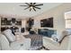 Open-concept living room with a view of the kitchen and dining area at 757 Goodman Cove St, Henderson, NV 89011