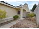 Front entry with walkway, landscaping and a door at 7701 Sea Cliff Way, Las Vegas, NV 89128