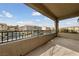 Private balcony overlooking community and mountain views at 7852 Garden Rock St, Las Vegas, NV 89149