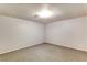 Spacious basement bedroom with carpeted floor at 830 Park Ln, Henderson, NV 89015
