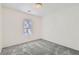 Cozy bedroom featuring new carpet, fresh paint, and natural light at 9140 Silk Threads Ave, Las Vegas, NV 89149