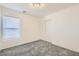 Carpeted bedroom featuring a window, baseboard trim and a closet at 9140 Silk Threads Ave, Las Vegas, NV 89149