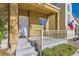 Close up view of the home's small front porch, the front door and the steps leading up to the porch at 9140 Silk Threads Ave, Las Vegas, NV 89149