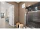 Hallway view features an elevator and a glimpse of the living space at 9145 Las Manaitas Ave # 401, Las Vegas, NV 89144