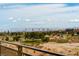 Picturesque golf course view with lush greenery and the Las Vegas skyline in the distance at 9145 Las Manaitas Ave # 401, Las Vegas, NV 89144
