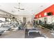 Well-equipped community gym with modern exercise machines, weights, and mirrored walls at 9145 Las Manaitas Ave # 401, Las Vegas, NV 89144