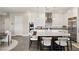 Elegant kitchen features stainless appliances and a breakfast bar at 9145 Las Manaitas Ave # 401, Las Vegas, NV 89144