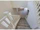 View from above of a modern staircase leading to the main floor at 9159 Oxford Blue Ave, Las Vegas, NV 89148