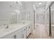 Bathroom with double vanity and access to bedroom at 9901 Trailwood Dr # 1058, Las Vegas, NV 89134