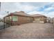 Home's exterior with a large driveway and gate at 2818 Belmont Dr, Henderson, NV 89074