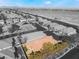 Aerial view of single-story house with tile roof, landscaping, and desert mountain views at 10397 Station Creek Cir, Las Vegas, NV 89178