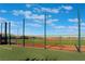 Exterior view of a baseball field with protective fencing; a great place to practice your baseball skills at 10397 Station Creek Cir, Las Vegas, NV 89178
