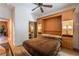 Bedroom with built-in murphy bed and access to bathroom at 10397 Station Creek Cir, Las Vegas, NV 89178