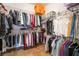 Large walk-in closet with ample hanging space and shelving at 10397 Station Creek Cir, Las Vegas, NV 89178