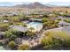 Aerial view of The Club at Yellowstone showcasing the sparkling pool, common areas, and desert setting at 10397 Station Creek Cir, Las Vegas, NV 89178