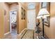 Bright entryway with wood-like flooring and a glass-top console table at 10397 Station Creek Cir, Las Vegas, NV 89178